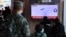 People watch a TV broadcasting a news report on North Korea firing three ballistic missiles into the sea, in Seoul, South Korea, Nov. 2, 2022. (Yonhap via Reuters)
