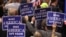 Delegates hold signs during speeches at the Republican National Convention, Cleveland, Ohio, July 18, 2016. 