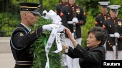 South Korean President Park Geun-hye lays a wreath at the Tomb of the Unknown Soldier at Arlington National Cemetery, May 6, 2013.
