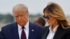 US President Donald Trump and First Lady Melania Trump walk to Marine One to depart from the South Lawn of the White House in Washington, DC, on Sept. 29, 2020.