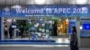 A woman walks past the venue of the upcoming Asia-Pacific Economic Cooperation (APEC) in Bangkok, Thailand, Nov. 15, 2022.