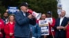 President Joe Biden speaks to striking United Auto Workers on the picket line outside the Willow Run Redistribution Center, UAW Local 174, Sept. 26, 2023, in Van Buren Township, Mich.