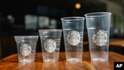 This photo provided by Starbucks shows a new version of the company's cold cup that is said to be made with up to 20% less plastic.
