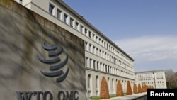 资料照：2021年3月4日，位于瑞士日内瓦的世界贸易组织(WTO)总部的标志。