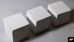 Mortar cubes rest in the product lab at Fortera's facility in San Jose, Calif., Wednesday, April 10, 2024. (AP Photo/Benjamin Fanjoy)