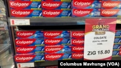 FILE - Items at a shop are priced in Zimbabwe Gold (ZiG), the country's new gold-based currency, in Harare, Zimbabwe, June 28, 2024.