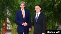 中国国家副主席韩正在北京会晤到访的美国气候特使克里。（2023年7月19日）