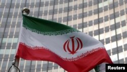 ফাইল- ভিয়েনায় আন্তর্জাতিক আণবিক শক্তি সংস্থার সদর দপ্তরে ইরানের পতাকা উড়তে দেখা যাচ্ছে। 