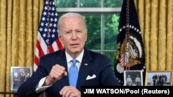 Presiden AS Joe Biden mengumumkan Kesepakatan Anggaran Bipartisan dari Ruang Oval di Gedung Putih, Washington DC, Sabtu, 2 Juni 2023. Kesepakatan itu berhasil meloloskan AS dari ancaman gagal bayar utang yang diperkirakan pada 5 Juni nanti. (Foto: JIM WATSON/Pool via REUTERS)