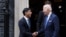 British Prime Minister Rishi Sunak shakes hands with U.S. President Joe Biden after their meeting at 10 Downing Street in London, July 10, 2023. 