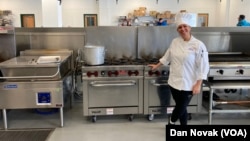 Clarissa Haglid, a graduate of the culinary school at the Delaware Food Bank, in the food bank's kitchen on February 7, 2024. Haglid received an apprenticeship at a nearby hotel following her completion of the program. (Dan Novak/VOA)