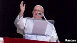 Pope Francis leads the Angelus prayer from his window, at the Vatican, June 16, 2024. (Vatican Media/­Handout via Reuters)