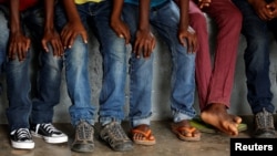 FILE - Congolese children used in armed conflicts and former child soldiers receive psycho-social support at the Centre for Orientation and Transit for Children associated with militias in Mbuji Mayi, in the Democratic Republic of Congo, March 14, 2018.