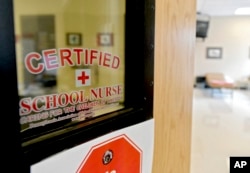 FILE - This Aug. 15, 2016, photo shows the front of the Bellefonte Area School District certified school nurses office in Pennsylvania. (Abby Drey/Centre Daily Times via AP, file)