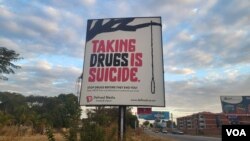 A billboard warns of the dangers of drug use, in Harare, Zimbabwe, June 25, 2024. (Columbus Mavhunga/VOA)