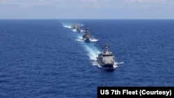 美国、日本、澳大利亚和菲律宾四国海军2024年4月7日在南中国海举行联合军演。（照片来自美国第七舰队X平台）