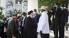 Shugaban kasar Iran Ebrahim Raisi tare da shugaban kasar Uganda's President Yoweri Museveni.