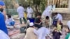 In this handout photo released by MSF Afghanistan, injured people received treatment after a powerful earthquake in Herat province, western of Afghanistan, Oct. 15, 2023. (MSF Afghanistan via AP)