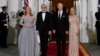 President Joe Biden and first lady Jill Biden welcome Australian Prime Minister Anthony Albanese and his partner, Jodie Haydon, for a state dinner at the White House, Oct. 25, 2023, in Washington.