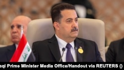 ফাইল-সৌদি আরবের জেদ্দাহ-তে আরব লীগের শীর্ষ সম্মেলনে ইরাকের প্রধানমন্ত্রী মহম্মদ শিয়া আল-সুদানিকে দেখা যাচ্ছে। ১৯ মে, ২০২৩। (রয়টার্স মারফত ইরাকি প্রধানমন্ত্রীর মিডিয়া দফতর) 