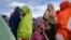 Somali women are seen at a camp for displaced people on the outskirts of Dollow, Somalia, Sept. 19, 2022. Women and girls in displaced communities in Somalia are experiencing a spike in gender-bases violence, according to U.N. data.