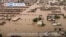 VOA60 Africa - Parts of eastern Sudan still submerged after dam collapse