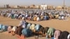 Muslim devotees offer Eid al-Fitr prayers, which marks the end of the holy fasting month of Ramadan at the Guzargah mosque in Herat, Afghanistan, April 10, 2024.