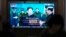A TV screen shows a report of North Korea's rocket launch with file footage of North Korean leader Kim Jong Un appears during a news program at the Seoul Railway Station in Seoul, South Korea, Aug. 24, 2023. 