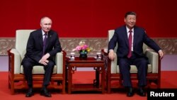 中国领导人习近平与俄罗斯总统普京在北京出席庆祝中俄建交75周年的专场音乐会。（2024年5月16日）