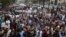 Traders shout slogans during a protest at a street in Karachi, Aug. 23, 2023, against the surge in petrol and electricity prices as Pakistan endures soaring inflation. 