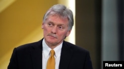 FILE - Kremlin spokesman Dmitry Peskov attends a press conference in Moscow, Dec. 14, 2023. Peskov hailed, Feb. 23, 2025, dialogue between U.S. President Donald Trump and Russian President Vladimir Putin as 'promising.' 