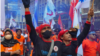 Puluhan ribu buruh yang berunjuk rasa pada Hari Buruh 2023 di Tugu Kuda, Jakarta memiliki tuntutan di antaranya meminta pemerintah mencabut UU Cipta Kerja dan penghapusan sistem kerja outsourcing, Senin, 1 Mei 2023. (Foto: VOA/Indra Yoga)