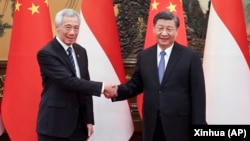 中国领导人习近平在北京会晤到访的新加坡总理李显龙。（资料照片，2023年3月31日）