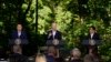 South Korea's President Yoon Suk Yeol, left, and Japan's Prime Minister Fumio Kishida, right, listen as President Joe Biden speaks during a news conference, Aug. 18, 2023, at Camp David, the presidential retreat, near Thurmont, Md.