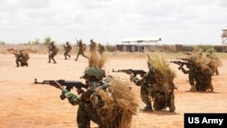 FILE - Recruits of the Somali National Army Danab Advanced Infantry Brigade mark the completion of their intensive basic training program at Baledogle Military Airfield, Somalia, April 9, 2023.