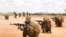 FILE - Recruits of the Somali National Army Danab Advanced Infantry Brigade mark the completion of their intensive basic training program at Baledogle Military Airfield, Somalia, April 9, 2023.