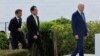 From left, France's President Emmanuel Macron, Japan's Prime Minister Fumio Kishida and US President Joe Biden walk before an economic security meeting during the G7 summit, at the Grand Prince Hotel in Hiroshima, Japan, May 20, 2023.