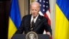 President Joe Biden attends a news conference with Ukrainian President Volodymyr Zelenskyy in the Indian Treaty Room in the Eisenhower Executive Office Building on the White House Campus, Dec. 12, 2023. 