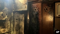 Moto uliyowashwa katika Sinagogi na mshukiwa ambaye polisi walimpiga risasi mjini Rouen, Ufaransa, 