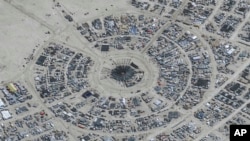 ទិដ្ឋភាព​ទូទៅ​នៃ​ពិធី​បុណ្យ Burning Man នៅវាល​លំហ Black Rock ក្នុង​រដ្ឋ Nevada នៅថ្ងៃទី ២៨ ខែសីហា ឆ្នាំ២០២៣។ (©2023 Maxar Technologies via AP) 