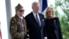 President Joe Biden and first lady Jill Biden, greet a World War II veteran during ceremonies to mark the 80th anniversary of D-Day, June 6, 2024, in Normandy. 