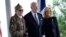 President Joe Biden and first lady Jill Biden, greet a World War II veteran during ceremonies to mark the 80th anniversary of D-Day, June 6, 2024, in Normandy. 