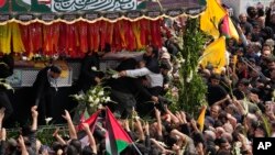 በኢራን የሀማስ የፖለቲካ መሪ ኢስማኤል ሃኒዬ የአስከሬን ሽኝት ሥነ ሥርዓት (AP Photo/Vahid Salemi)