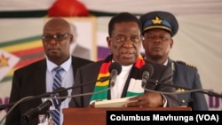 FILE - President Emmerson Mnangagwa speaks in Harare, Zimbabwe, on March 20, 2024.