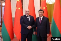 中国领导人习近平在北京人大会堂与到访的白俄罗斯总统卢卡申科举行会谈。（2023年3月1日）