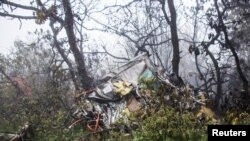 የኢራኑ ፕሬዚዳንት ኢብራሂም ራይሲ ትላንት እሁድ ኢራን ውስጥ በደረሰ የኤሊኮፕተር አደጋ ሕይወታቸው አልፏል በቫርዛጋን አካባቢ ከሚገኘው ተራራማ ሥፍራ የኤሊኮፕተሩ ስብርባሪ ይታያል፡፡ 