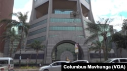 The Reserve Bank of Zimbabwe has frozen assets of four men who told the al-Jazeera television channel they accepted money to assist a gold smuggling and money laundering ring that has operated for the past 23 years. 