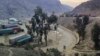 FILE - Trucks loaded with goods are seen parked at border crossing point Torkham in Afghanistan's eastern Nangarhar province, on the country's border with Pakistan, Feb. 21, 2023. Pakistani authorities closed the crossing on Sept. 6, 2023.