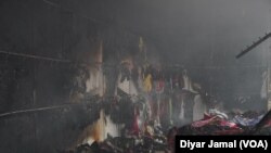 دیمەنی پاشماوەی یەکێک لە دوکانەکانی لەگەی هەولێر دوای سوتانی لە بەرواری 8-4-2024.