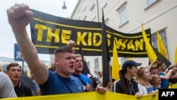Participants of the Identitarian movement take part in a demonstration in Vienna, Austria, July 20, 2024. 